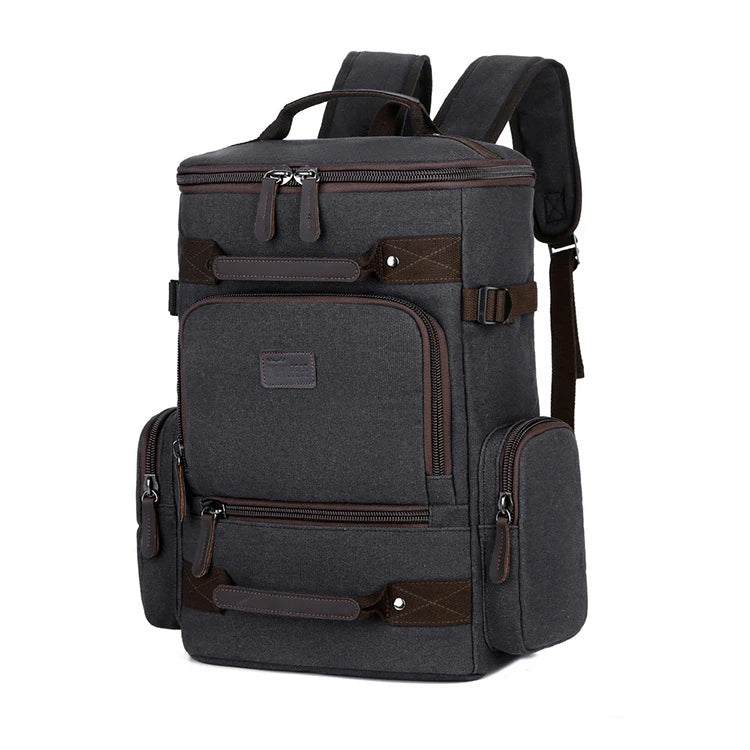 A classic messenger bag made of durable canvas with genuine leather trim, offering style and function for the modern British gentleman