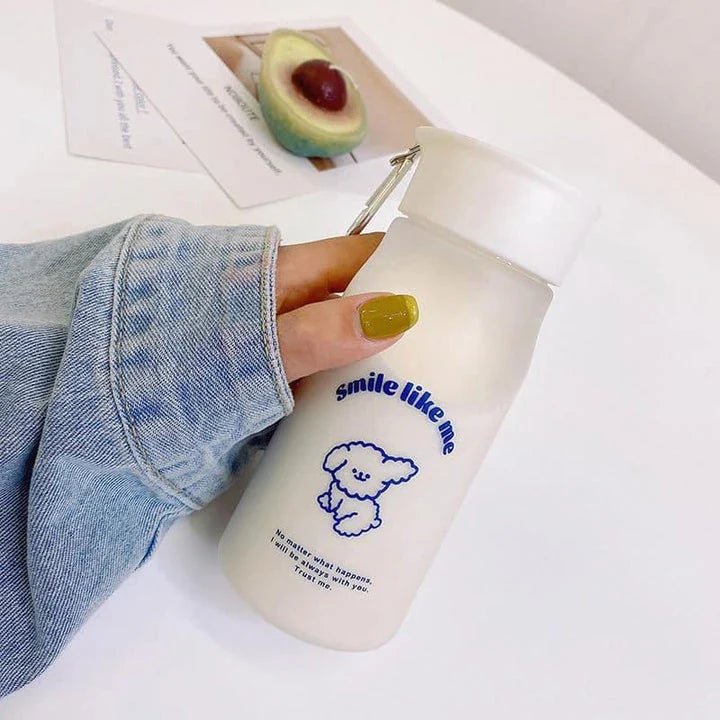 A frosted plastic water bottle with a cartoon dog design, perfect for everyday hydration and a fun, playful look.