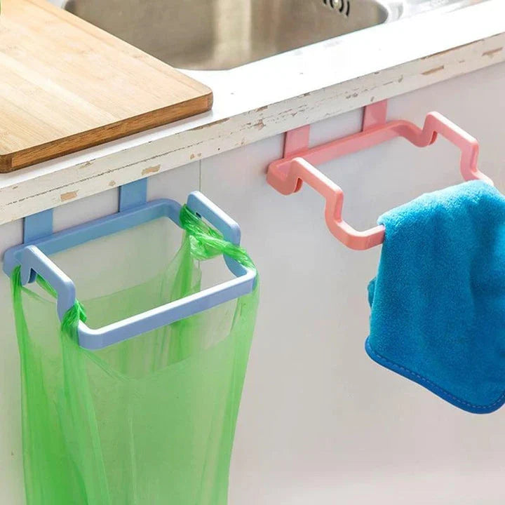 Cupboard-mounted trash bag holder in various colours for organising kitchen waste storage