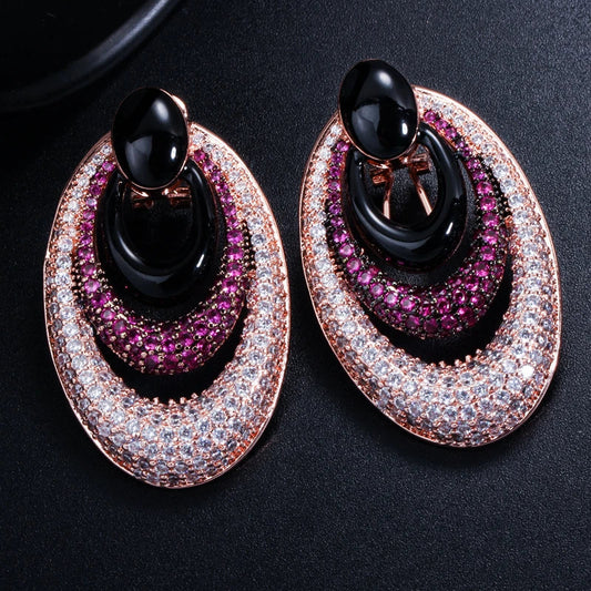 Elegant water drop-shaped ear studs in a vibrant red hue, adorned with a micro-inlaid zircon gemstone for a dazzling, sophisticated look.