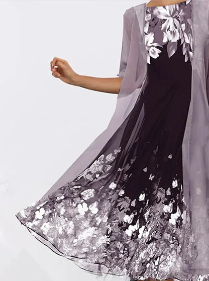 A stylish, multi-colour long dress made from high-quality chiffon fabric, featuring a comfortable swing skirt and versatile 3/4 sleeves.