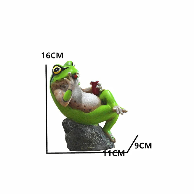 Charming resin frog garden ornaments in various poses and colours, perfect for adding a whimsical touch to outdoor spaces.