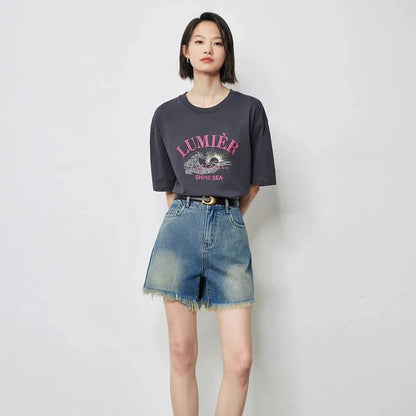 Vintage-inspired high-waisted denim shorts with tassel detailing for women