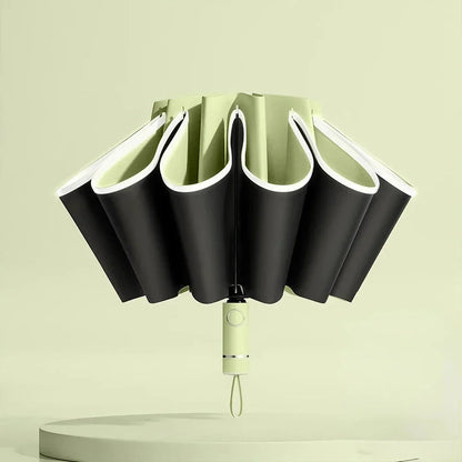 Premium auto-open reverse folding umbrella with reflective safety strip for all-weather protection