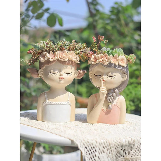 Charming 7.8-inch fairy girl planter made of high-quality resin with hand-painted details, perfect for succulents and small plants