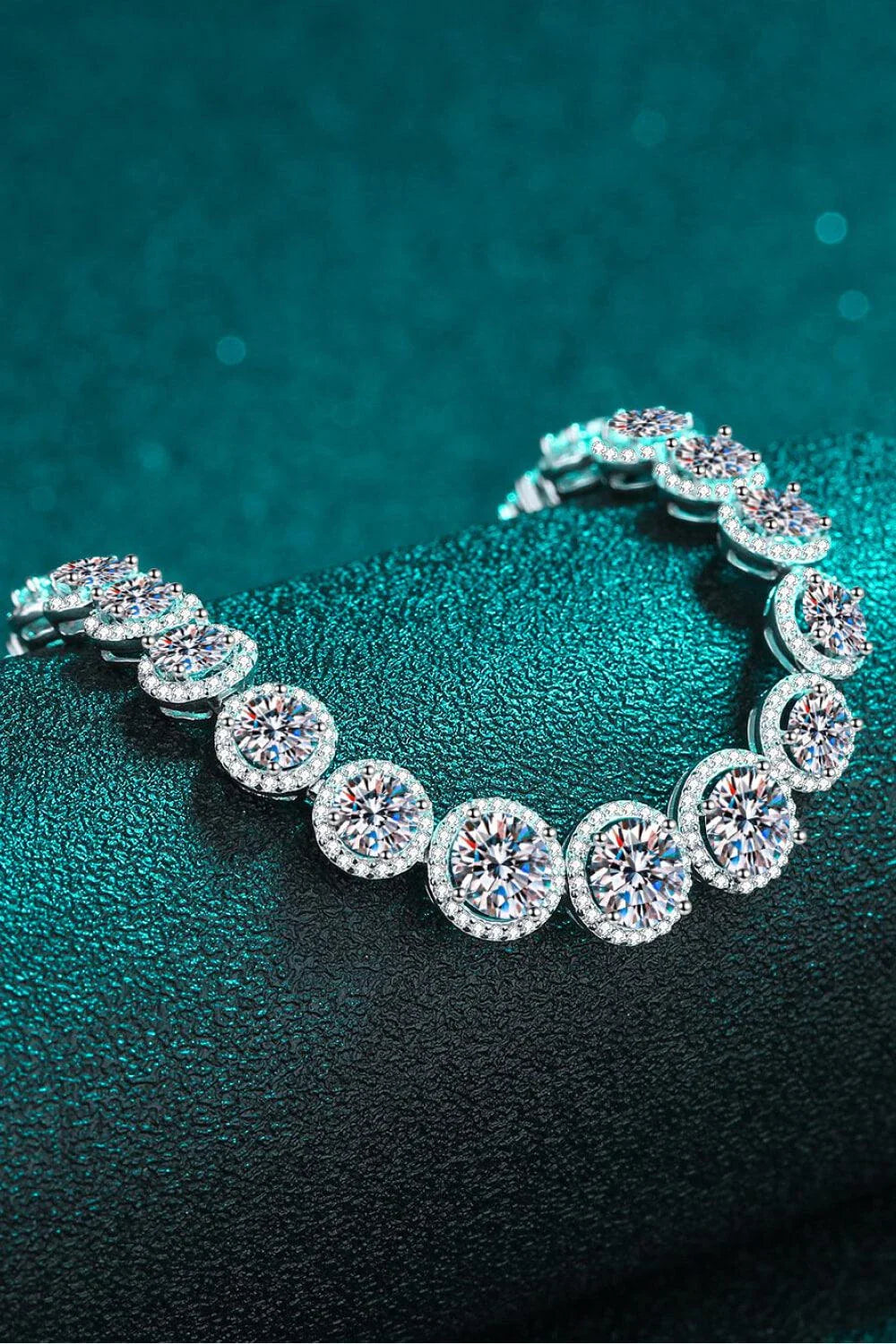 Sparkling moissanite stones set in a polished 925 sterling silver bracelet with a minimalist, elegant design