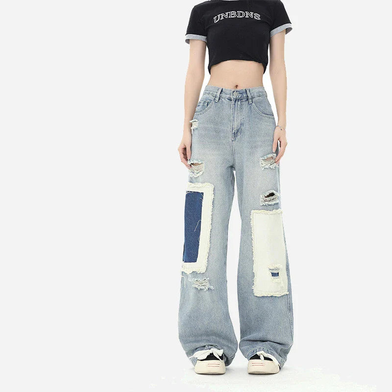 Premium heavy-duty straight-fit British denim jeans with distressed detailing and a versatile silhouette