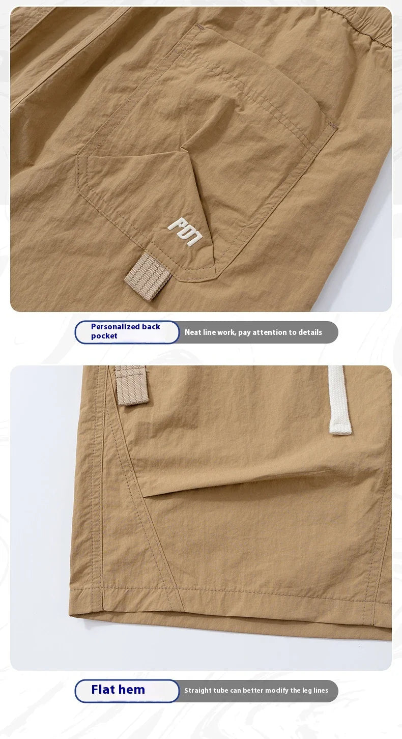 Premium Mountaineering Trousers in black and khaki colours, featuring a relaxed straight-leg fit and durable nylon construction for outdoor adventures.