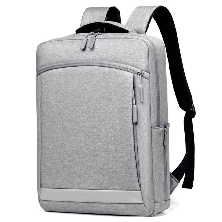 Premium laptop backpack in light grey colour, featuring a sleek and durable polyester design with multiple compartments for organised storage.