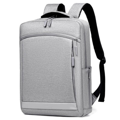Premium laptop backpack in light grey colour, featuring a sleek and durable polyester design with multiple compartments for organised storage.
