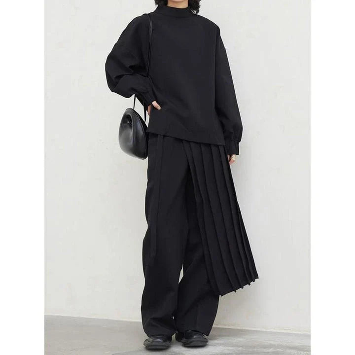 Fashionable pleated sweatshirt and wide-leg trousers set in grey, featuring a relaxed, comfortable silhouette and modern design.