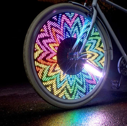 Bicycle Wheel Flashing Light with 32 LED lights in red, blue, and green colours that create a mesmerizing light show