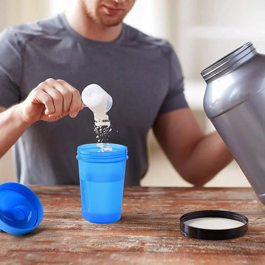 Premium protein shaker bottle with stainless steel whisk ball, BPA-free plastic, and leak-proof design for on-the-go fitness enthusiasts in the UK.