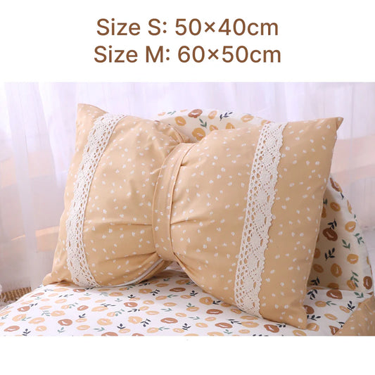 Cosy bow-accented pet bed with a detachable cushion, providing a luxurious and stylish sleeping retreat for small to medium-sized dogs and cats.
