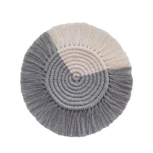 Elegant Boho Macrame Coaster in Timeless White, featuring a unique and artisanal design that adds a touch of rustic charm to any living space.