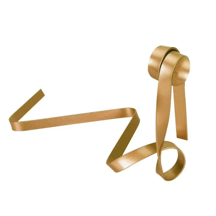 Floating wine bottle holder with sophisticated ribbon-like design, creating a mesmerising illusion of weightlessness