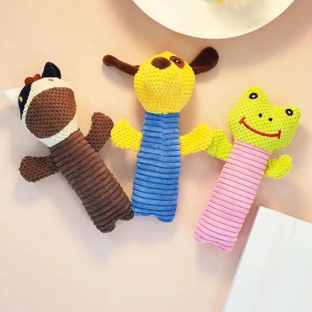 Interactive plush dog toys in the shape of corn kernels and dog figures, made of soft fleece material with built-in squeakers for endless playtime fun.