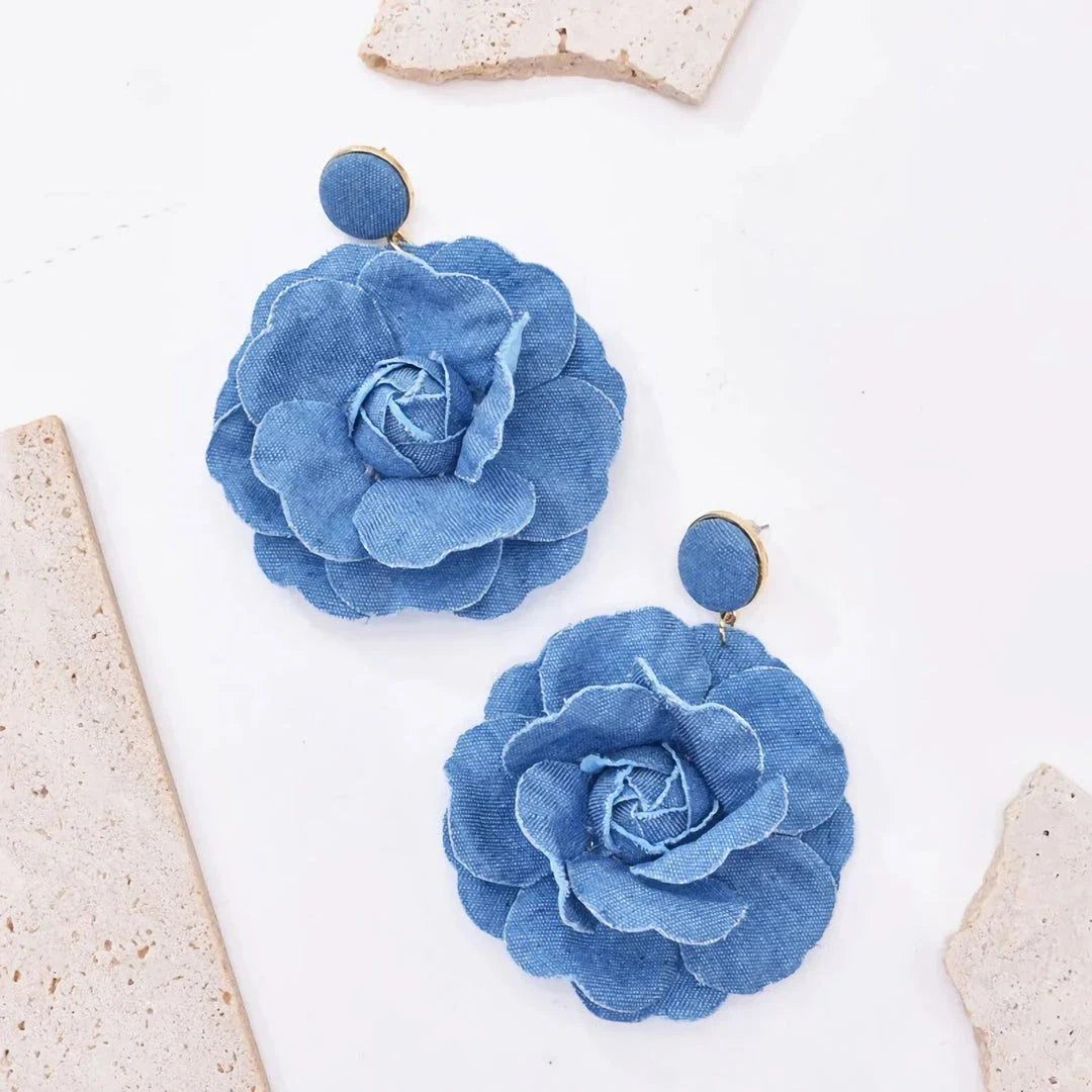 Exquisite denim drop earrings with charming accents, perfect for elevating British fashion and style