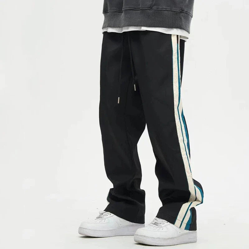 Relaxed fit straight leg trousers in black and dark blue colours, perfect for the modern gentleman's casual wardrobe