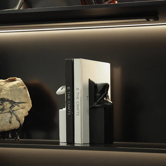 Elegant abstract sculpture in black and white, a minimalist desktop ornament that adds modern art decor to any space