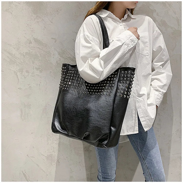 Premium British leather tote bag in black, featuring a large capacity design and stylish, versatile appeal.