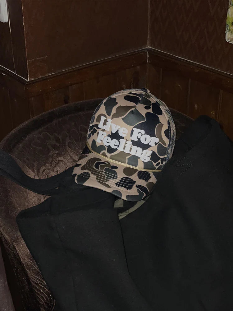 Stylish camouflage curved brim hat with embroidered lettering from Trendha