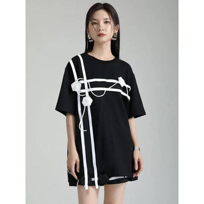 A stylish black and white floral half-sleeve casual t-shirt with a classic round neckline, perfect for everyday wear.