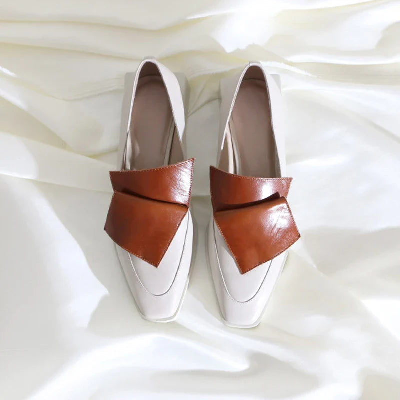 Stylish leather sateen shoes with a vibrant colour-matching design and low-heel comfort
