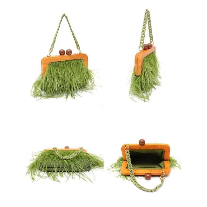 Luxury feather evening clutch with elegant acrylic chain decoration in green colour