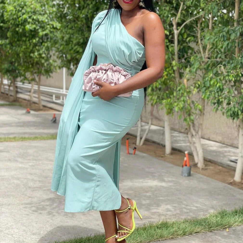 Sophisticated one-shoulder plus size evening dress with an alluring asymmetric neckline and figure-flattering silhouette