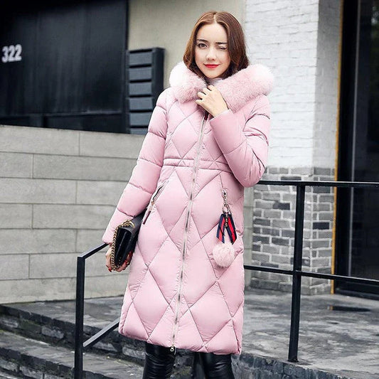 A premium padded down coat for women with a detachable hood, designed to provide warmth and style during the winter.