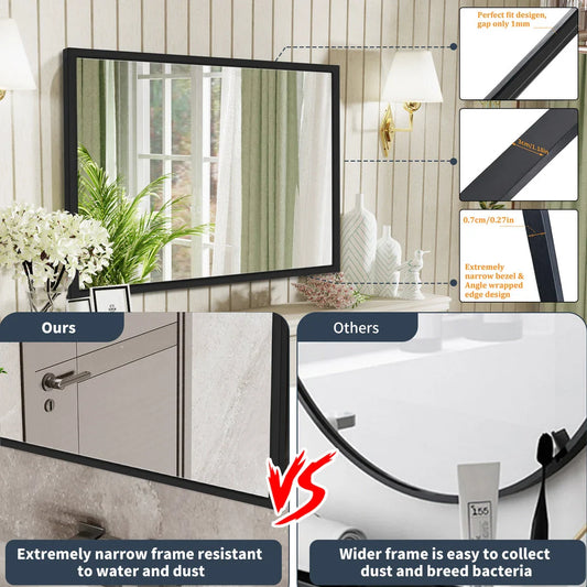 Sophisticated black metal framed wall mirror with rounded corners, reflecting a bright and spacious room