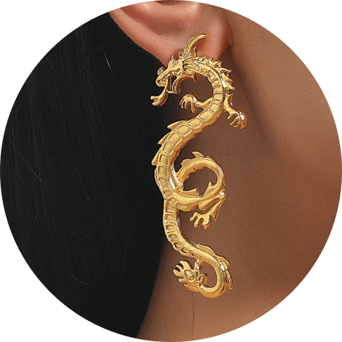 Stunning gold-coloured dragon stud earrings with intricate details, a fashionable accessory for UK customers