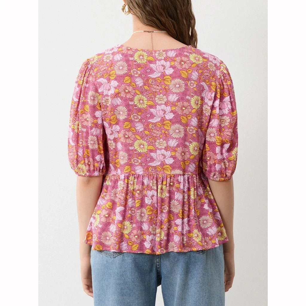 Elegant floral lace blouse with bow v-neck, showcasing vintage charm and modern comfort
