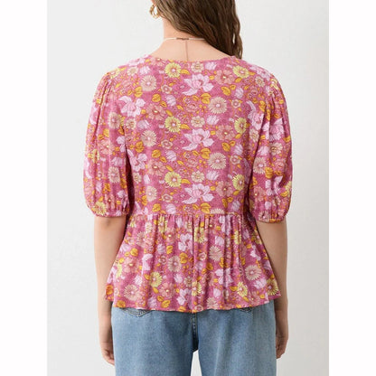 Elegant floral lace blouse with bow v-neck, showcasing vintage charm and modern comfort