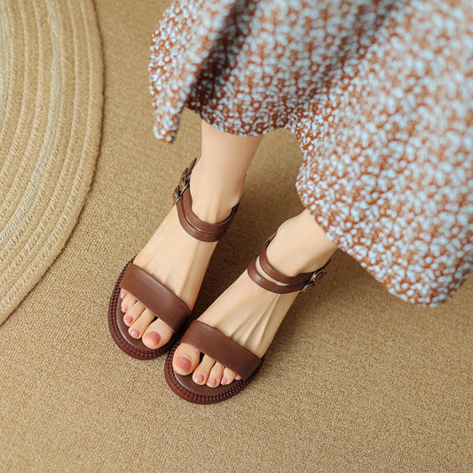 Elegant retro high heel leather sandals in khaki colour, with a sleek design and premium leather construction