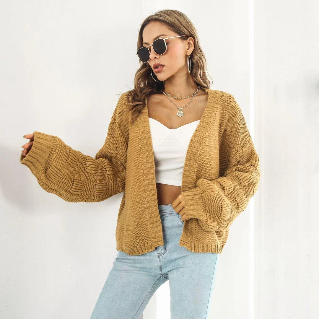 Elegant puff sleeve cardigan sweater in army green and wheat yellow colours, featuring a chunky knit design for cosy winter wear