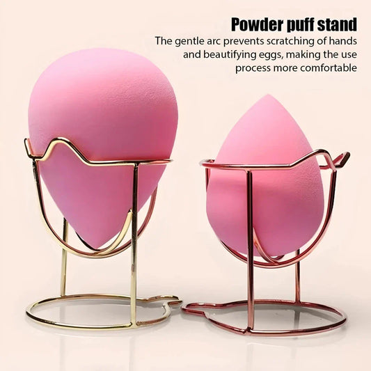 Elegant stainless steel makeup sponge drying rack in gold and rose gold finishes, designed to keep your beauty tools organised and fresh.
