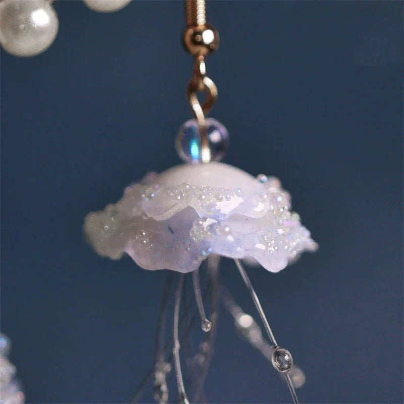 Elegant cloud-like jellyfish earrings with a captivating marine-inspired design, perfect for fashion-forward women in the UK