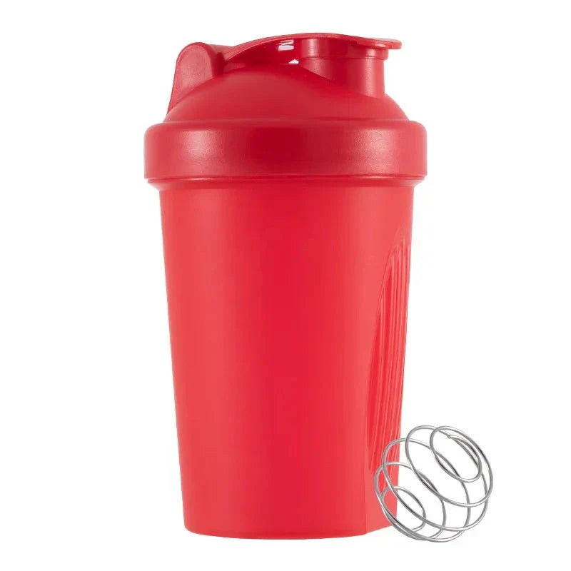 Premium protein shaker bottle with stainless steel whisk ball, BPA-free plastic, and leak-proof design for on-the-go fitness enthusiasts in the UK.