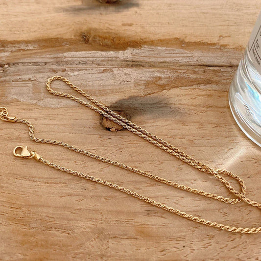 Sterling silver necklace with coastal-inspired fried dough twist design, handcrafted in the UK