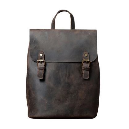 Premium vintage leather backpack with a classic design, featuring a spacious main compartment and adjustable padded shoulder straps for comfortable wear.