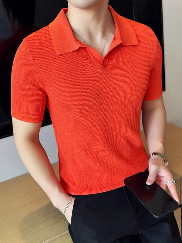 A premium cotton blend polo shirt in classic colours, featuring a v-neck lapel collar and slim fit design for a sophisticated casual look.