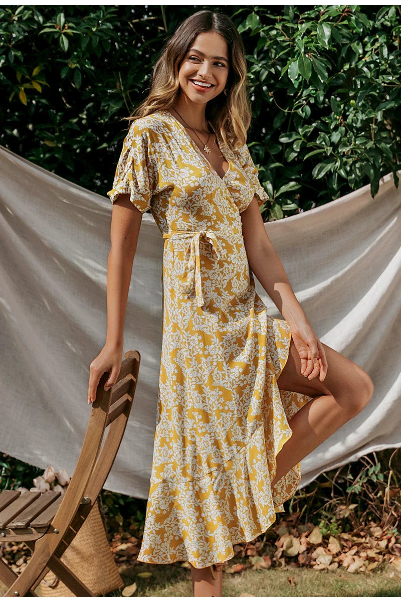 Elegant floral lace ruffle dress in yellow, featuring a cascading ruffled skirt and delicate lace overlay for a refined, British-inspired look.