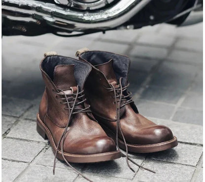Versatile brown leather-look men's boots with non-slip rubber sole and classic design