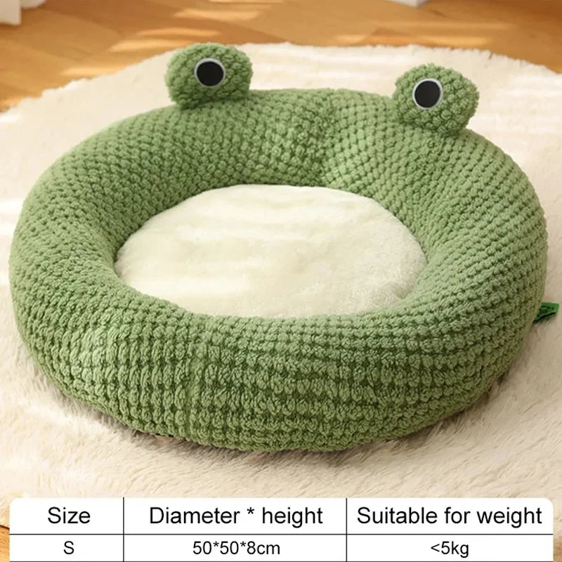 Cosy frog-shaped pet bed made of plush bubble velvet material, providing warmth and comfort for small cats and dogs