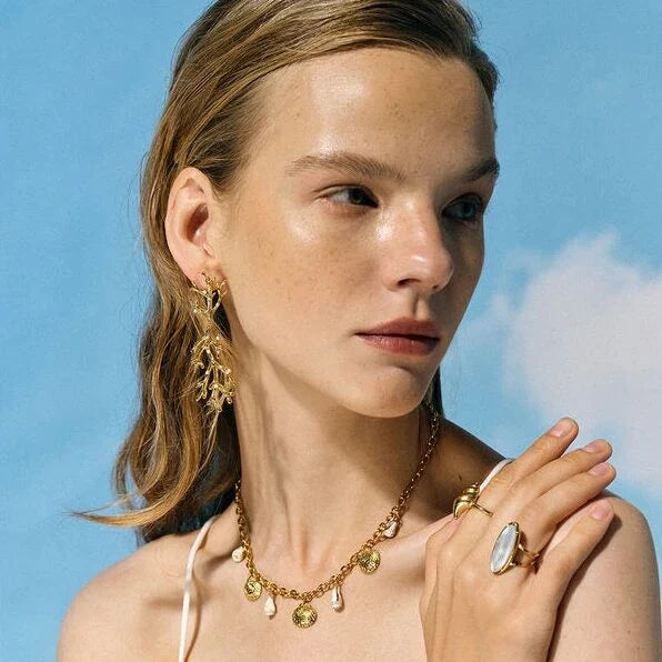 Elegant 18K gold plated coral pearl pendant earrings with a secure stud closure and a tarnish-proof finish