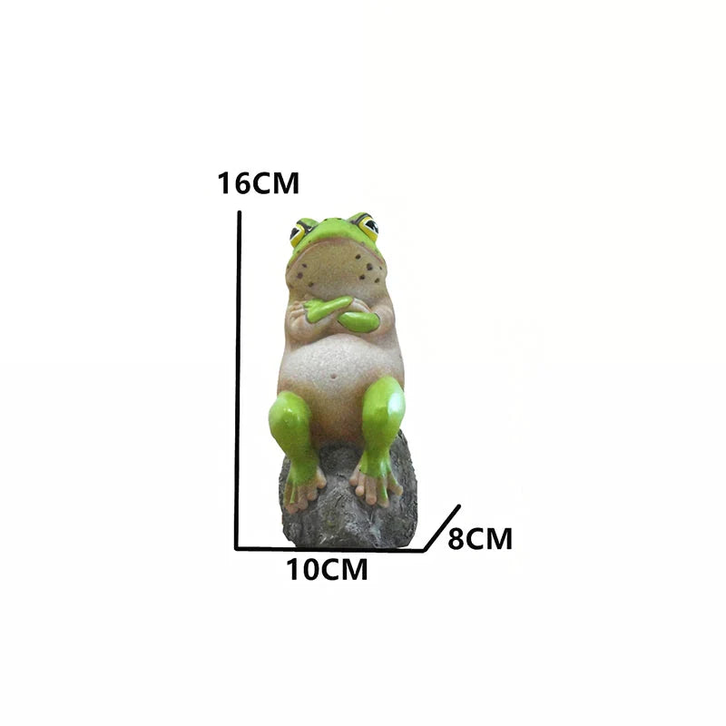 Charming resin frog garden ornaments in various poses and colours, perfect for adding a whimsical touch to outdoor spaces.