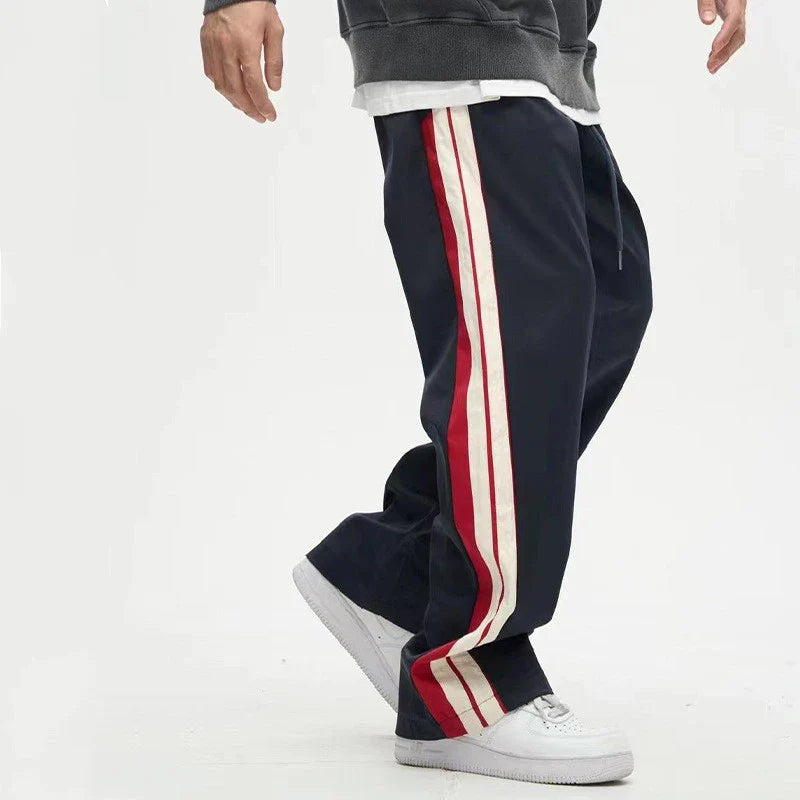 Relaxed fit straight leg trousers in black and dark blue colours, perfect for the modern gentleman's casual wardrobe