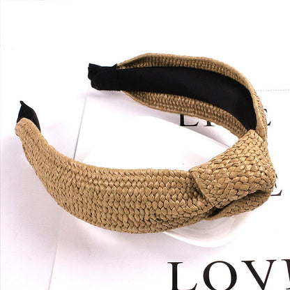Fashionable solid colour knotted headbands for women, made from high-quality hemp and rubber materials for comfort and style.